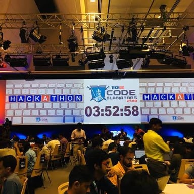 A programmer working at a hackathon