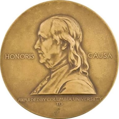 The Pulitzer Prize gold medal, representing the award.