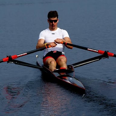 A sculling boat equipped with an oar.