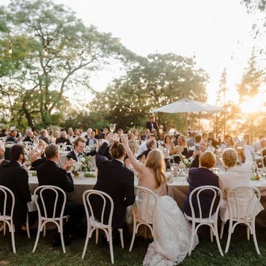 Guests celebrating at a wedding reception.