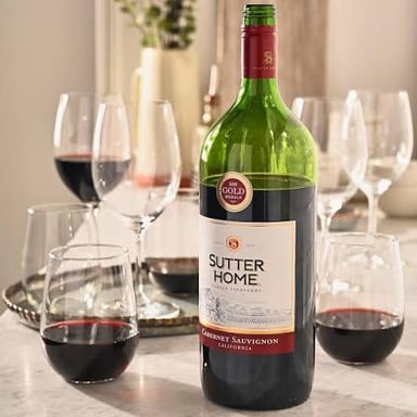 A glass and bottle of Cabernet Sauvignon red wine