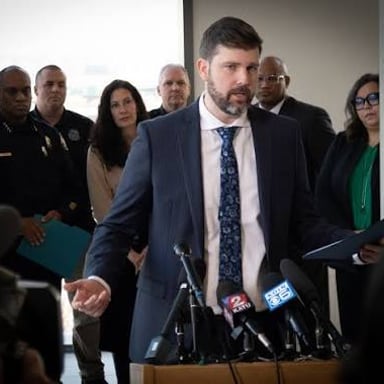 A prosecutor addressing a courtroom