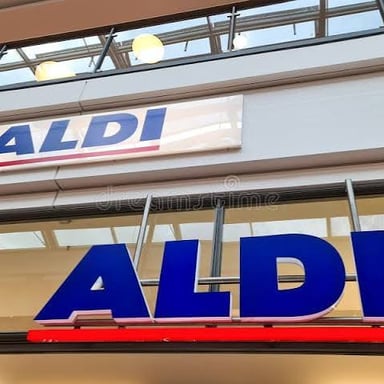 A supermarket storefront bearing the ALDI name.