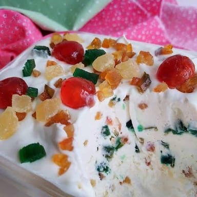 A scoop of brightly colored tutti-frutti ice cream.