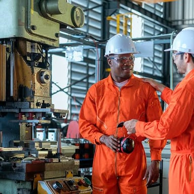 A workplace safety inspector examining an industrial site.