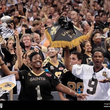 New Orleans Saints fans cheering in a stadium