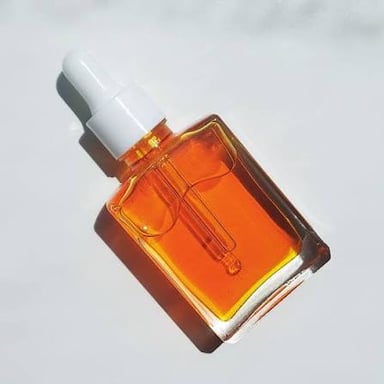 Skin-care serum in a glass dropper bottle