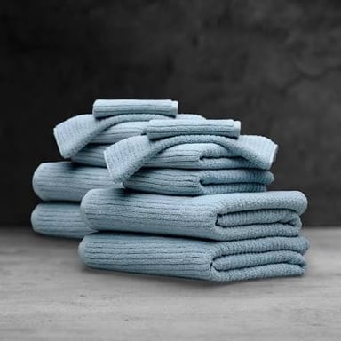 A towel that is damp but not dripping wet.