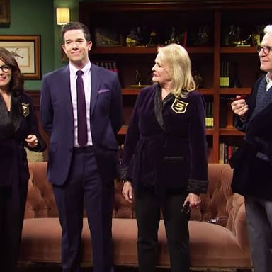 SNL hosts in the Five-Timers Club sketch, wearing the club’s red robes.