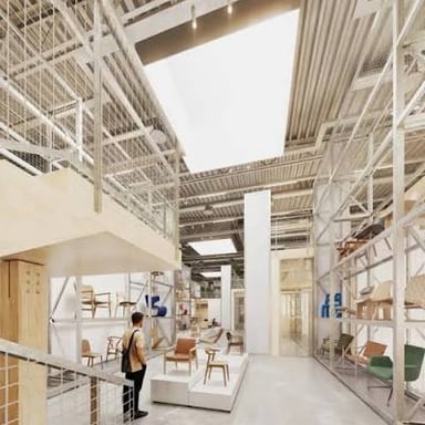 An IKEA furniture showroom with assembled home furnishings on display.