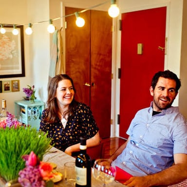 Friends gathered as guests in an apartment.
