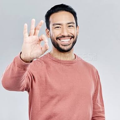 A person expressing enthusiastic agreement with a yes gesture.