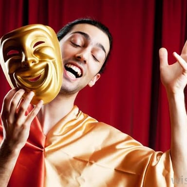 A theater actor making a dramatic facial expression onstage.