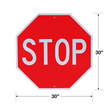 A red octagonal stop sign at a street intersection.