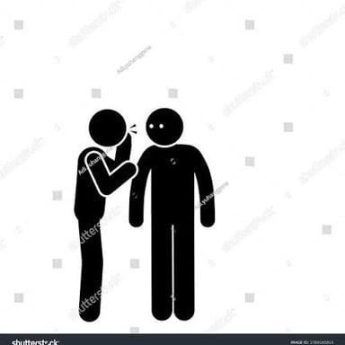 One person discreetly helping another person communicate.