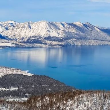 Snow-covered ski slopes and mountains near Lake Tahoe