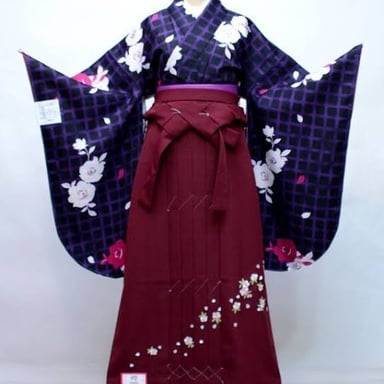A furisode kimono secured with a traditional obi sash