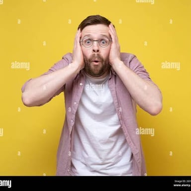 A person reacting with surprise to something unexpected.