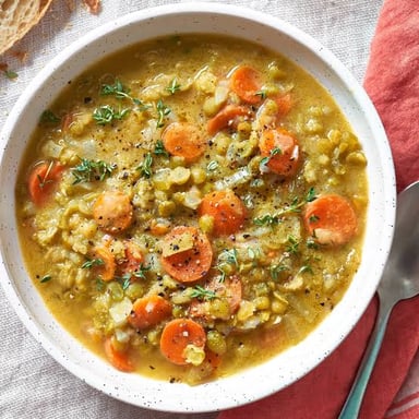 A bowl of thick split pea soup.