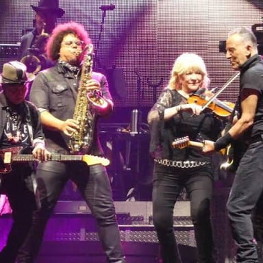 Bruce Springsteen performing with members of the E Street Band.