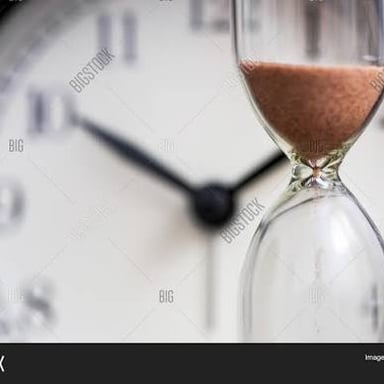 A clock and hourglass representing the passage of time