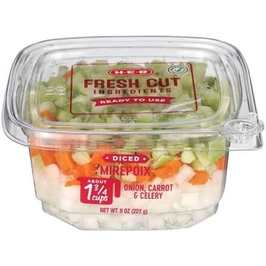 Chopped onions, carrots, and celery prepared together as a mirepoix.