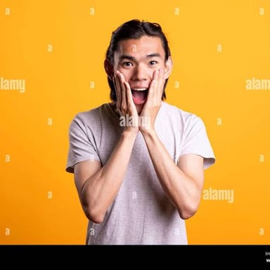 A person with an amazed expression, as if saying “ooh.”