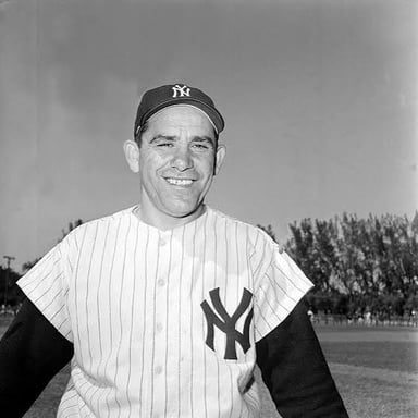 Yogi Berra in his New York Yankees uniform, the catcher who won 10 World Series championships as a player.