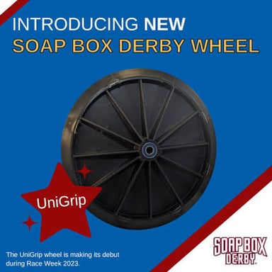 A gravity-powered Soap Box Derby car showing its wheel assembly.