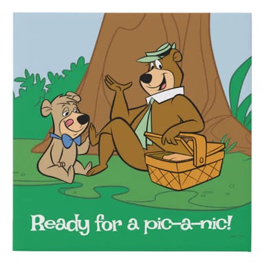 Yogi Bear cartoon character carrying or stealing a picnic basket