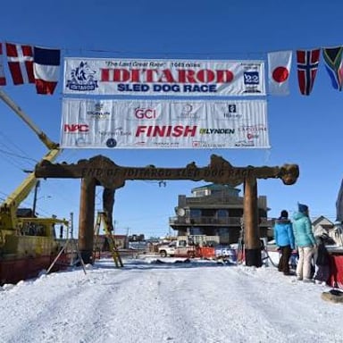 The Iditarod finish arch in Nome, Alaska, marking the end of the sled-dog race.