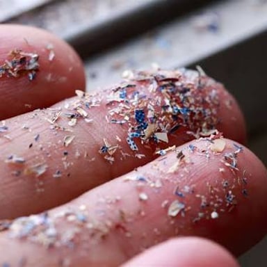 A close-up depiction of a very small quantity of particles.