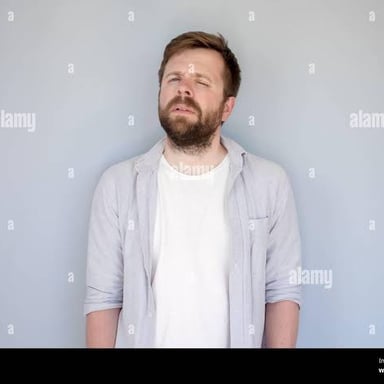 A person attempts to appear relaxed, illustrating the advice to act natural.