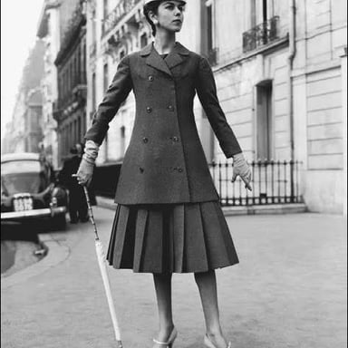A-line dress fitted at the top and flaring toward the hem.