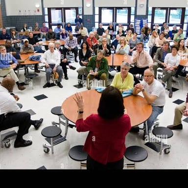 Parents and teachers gathered for a school community meeting.