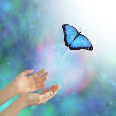 A hand opening to release an object.